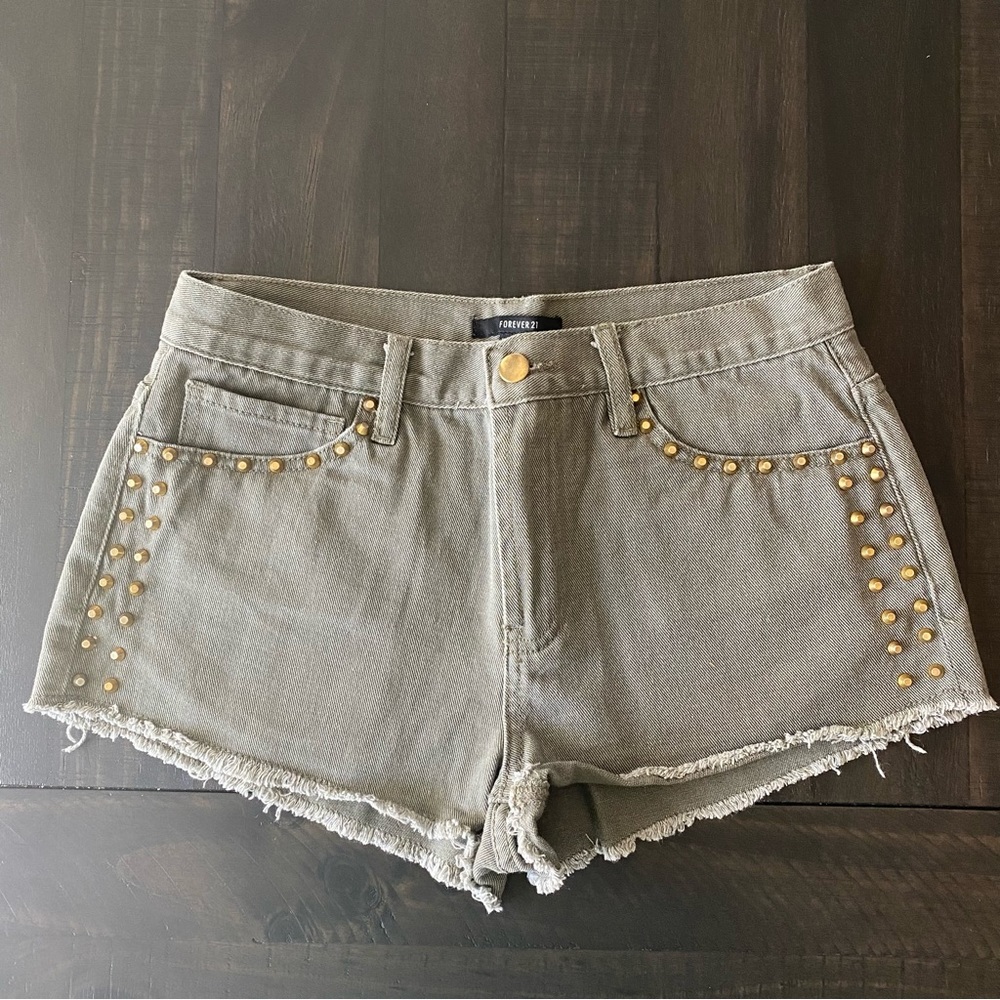 olive green denim jean shorts with gold stud accents